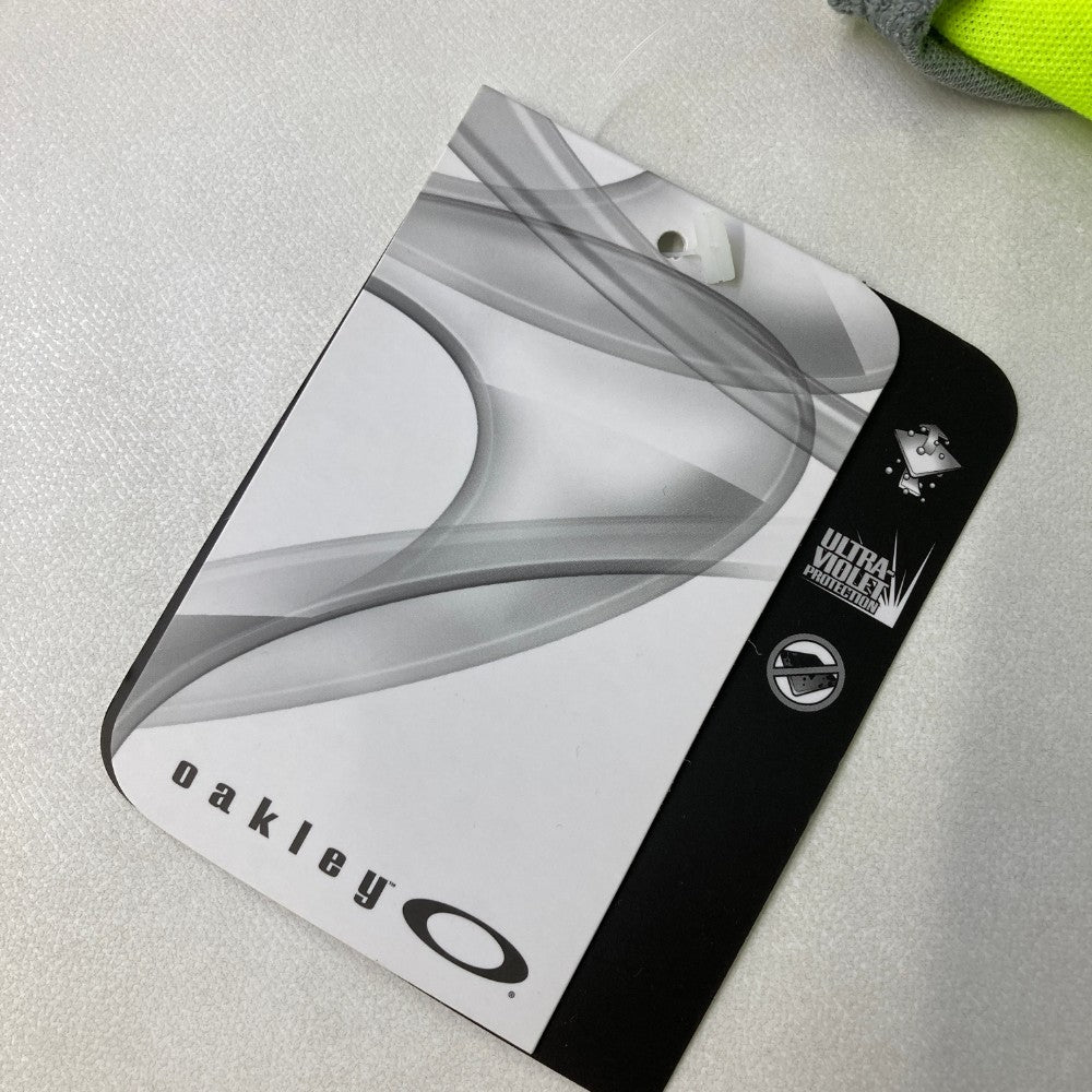 OAKLEY オークリー ノースリーブポロシャツ ボーダー柄 イエロー系 S
