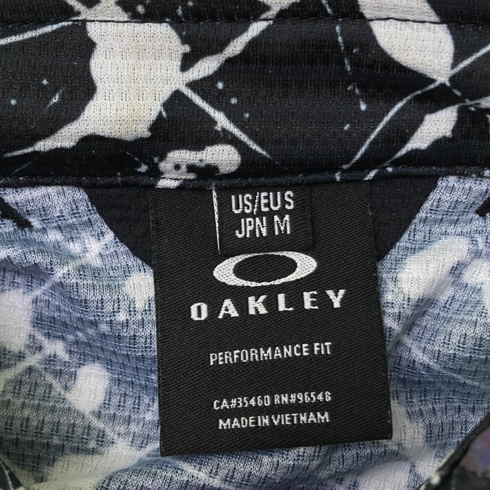 OAKLEY 오클리  반팔 폴로 셔츠 전면 프린트 블랙 계열 M