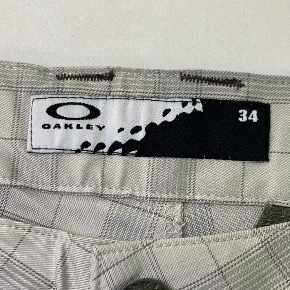 OAKLEY オークリー 421782JP ストレッチパンツ チェック柄 グレー系 34