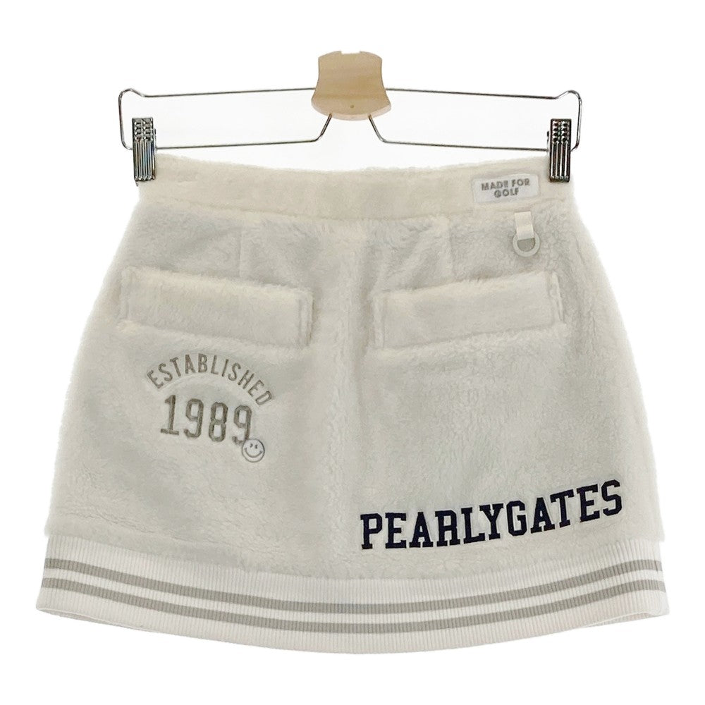 PEARLY GATES パーリーゲイツ 2023年モデル ; ボア ジップスカート ニコちゃん カレッジロゴ ホワイト系 0