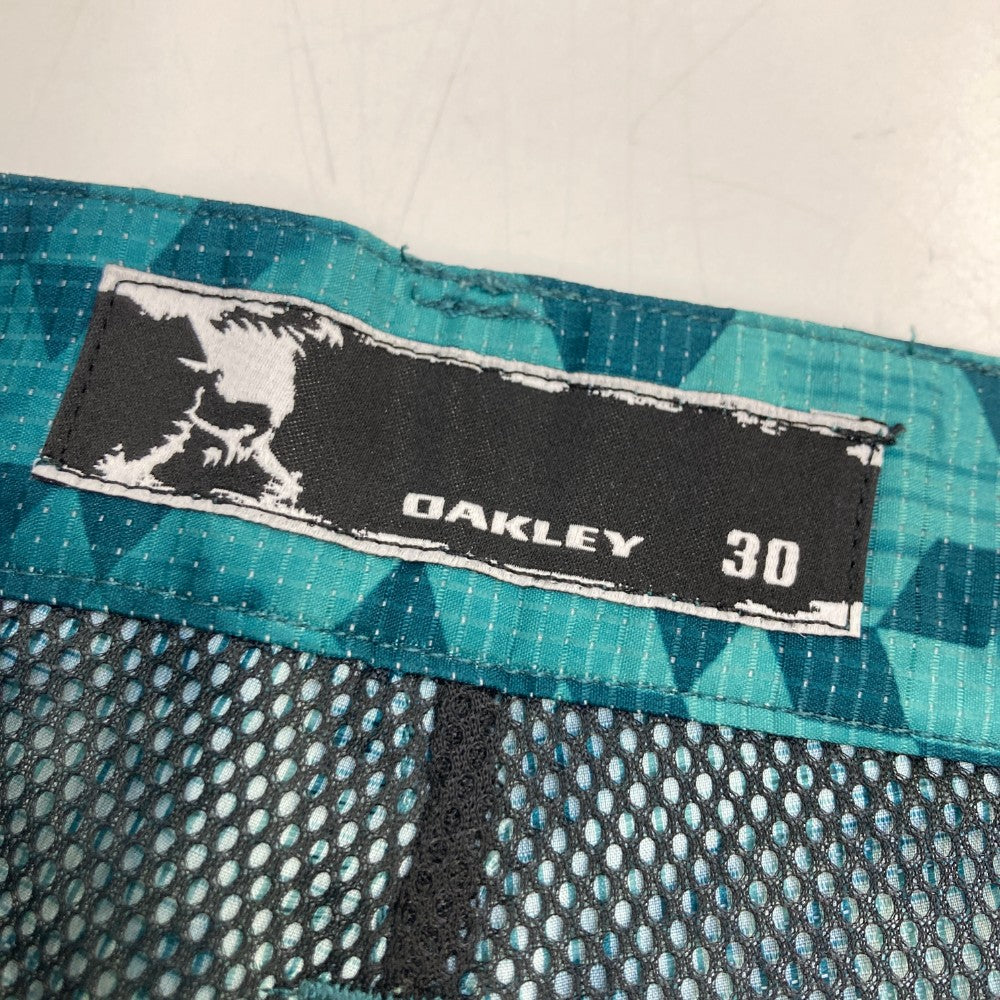 OAKLEY オークリー  ハーフパンツ スカル 総柄 グリーン系 30